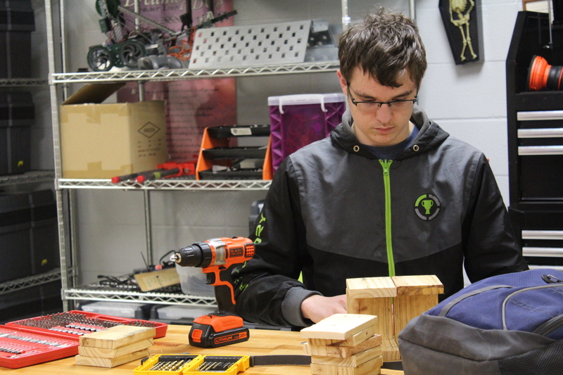  Senior Zac Hudson assembles his bird house